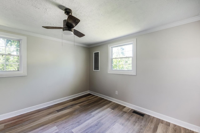 387 Stage Rd, Amherst, VA 24521 - unfurnished room featuring plenty of natural light, dark wood-style flooring, ceiling fan, ornamental molding, and a textured ceiling