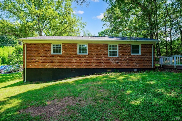 387 Stage Rd, Amherst, VA 24521 - view of side of home featuring crawl space, a lawn, brick siding, and a wooden deck