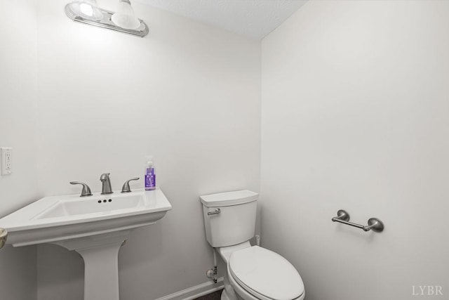 1036 Middle View Dr, Forest, VA 24551 - half bathroom featuring toilet and baseboards