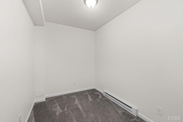 1036 Middle View Dr, Forest, VA 24551 - empty room featuring a baseboard heating unit, dark colored carpet, and a textured ceiling