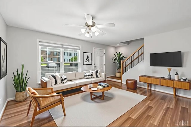 1036 Middle View Dr, Forest, VA 24551 - living area featuring wood finished floors, stairs, and ceiling fan