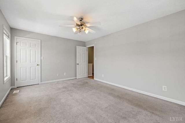 1036 Middle View Dr, Forest, VA 24551 - unfurnished bedroom featuring carpet flooring and a ceiling fan