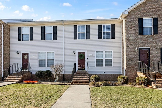 1036 Middle View Dr, Forest, VA 24551 - townhome / multi-family property with a front yard and brick siding