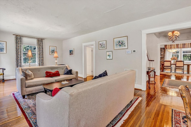 519 Belvedere St, Lynchburg, VA 24503 - living area featuring a chandelier and hardwood / wood-style floors