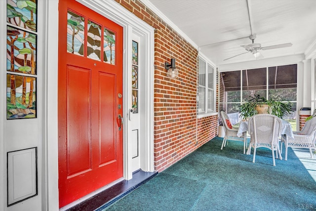 519 Belvedere St, Lynchburg, VA 24503 - entrance to property with covered porch, brick siding, and a ceiling fan