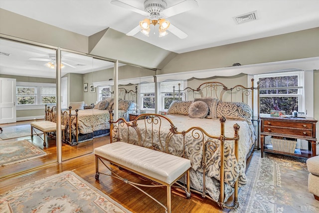 519 Belvedere St, Lynchburg, VA 24503 - bedroom featuring wood finished floors, vaulted ceiling, and ceiling fan