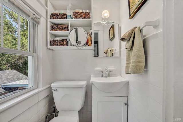519 Belvedere St, Lynchburg, VA 24503 - half bath with tile walls, plenty of natural light, and vanity