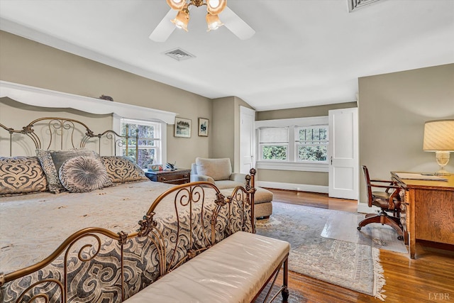 519 Belvedere St, Lynchburg, VA 24503 - bedroom featuring wood finished floors, a ceiling fan, and a desk