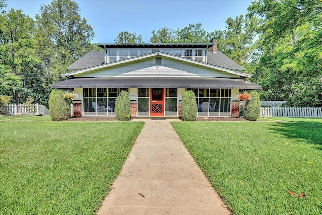 519 Belvedere St, Lynchburg, VA 24503 - view of front of home with a sunroom, brick siding, and a chimney