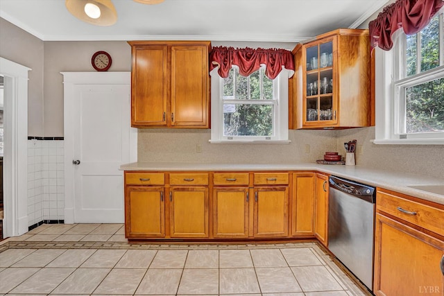 519 Belvedere St, Lynchburg, VA 24503 - kitchen with dishwasher, light tile patterned floors, light countertops, plenty of natural light, and crown molding