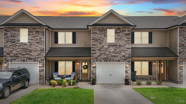 1055 Graystone Ln, Forest, VA 24551 - craftsman-style home featuring stone siding, driveway, a garage, and a shingled roof