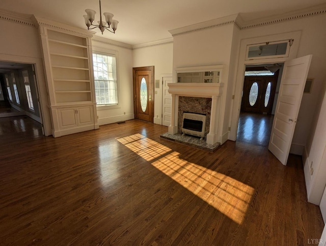 4059 Lowry Rd, Goode, VA 24570 - unfurnished living room featuring a chandelier, ornamental molding, dark wood-style floors, and a high end fireplace