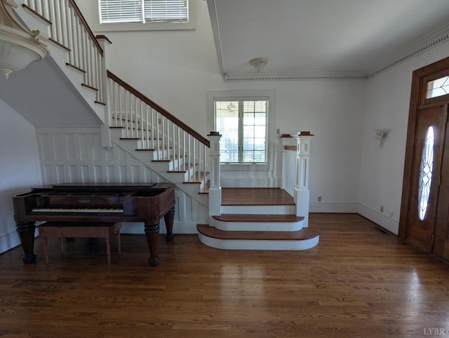 4059 Lowry Rd, Goode, VA 24570 - entryway with stairway, wood finished floors, and crown molding