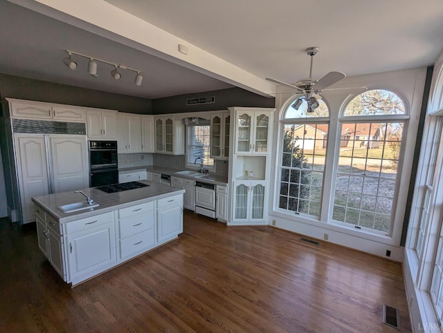 4059 Lowry Rd, Goode, VA 24570 - kitchen featuring black appliances, a ceiling fan, white cabinets, and dark wood-type flooring