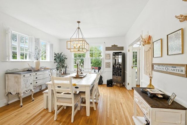 2212 Rivermont Ave, Lynchburg, VA 24503 - dining area with a chandelier and light wood-style floors