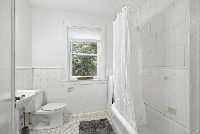 2212 Rivermont Ave, Lynchburg, VA 24503 - full bathroom featuring tile patterned flooring, shower / tub combo, tile walls, and wainscoting