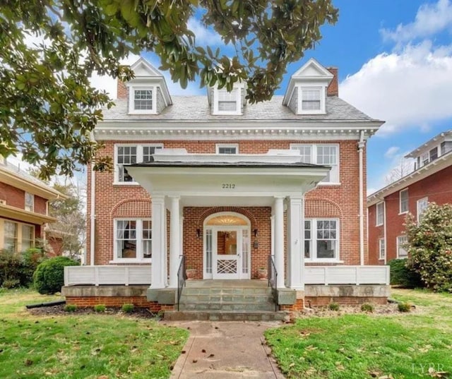 2212 Rivermont Ave, Lynchburg, VA 24503 - view of exterior entry featuring brick siding and a chimney