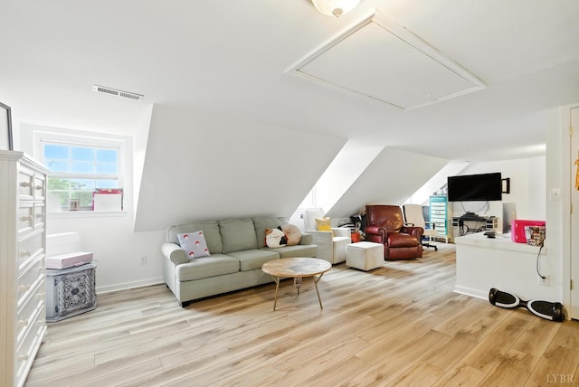 2212 Rivermont Ave, Lynchburg, VA 24503 - living area featuring attic access, plenty of natural light, light wood finished floors, and lofted ceiling