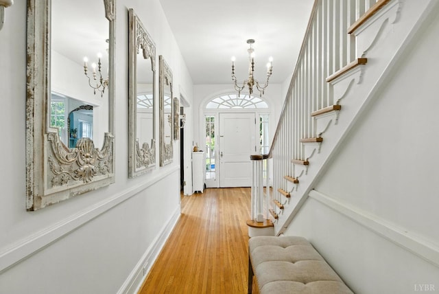2212 Rivermont Ave, Lynchburg, VA 24503 - entrance foyer with a chandelier, wood finished floors, and stairs