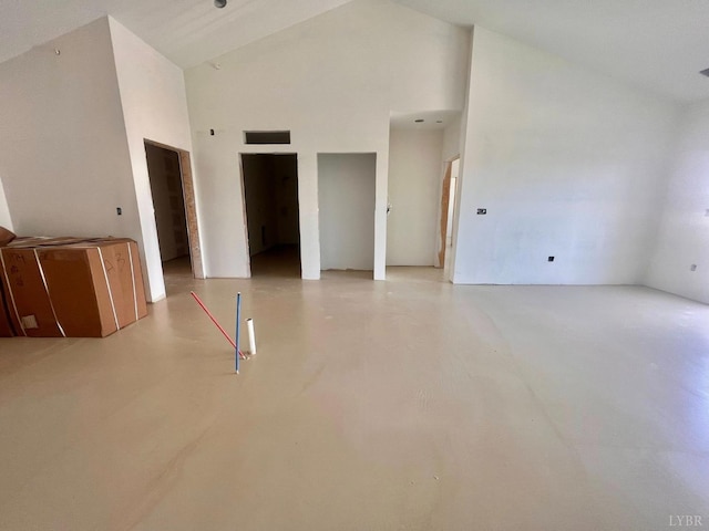 420 Capstone St Unit 107, Lynchburg, VA 24502 - unfurnished living room with high vaulted ceiling and finished concrete floors