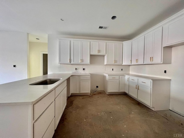 420 Capstone St Unit 107, Lynchburg, VA 24502 - kitchen with concrete flooring and white cabinetry