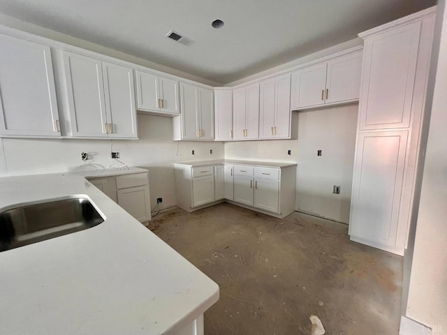 420 Capstone St Unit 107, Lynchburg, VA 24502 - kitchen with concrete floors and white cabinets