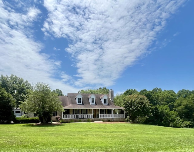 107 Mockingbird Cir, Bedford, VA 24523 - view of front facade featuring covered porch, a front yard, and a chimney