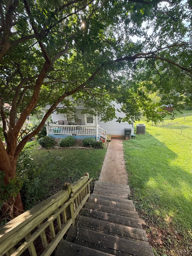 1119 Tyree St, Lynchburg, VA 24504 - view of green lawn featuring a porch and stairs