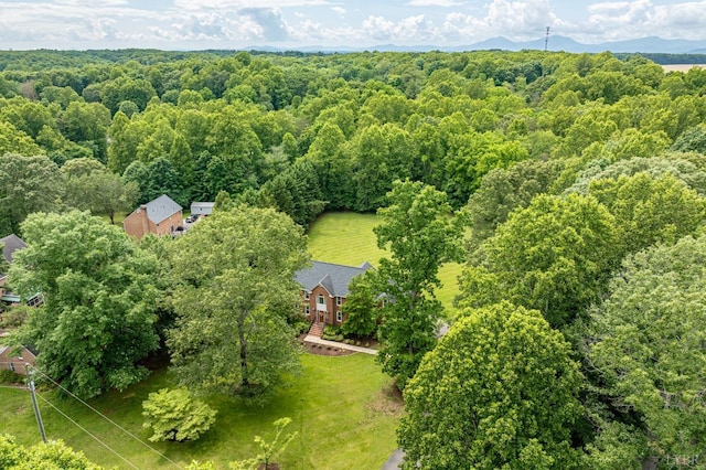 102 Stirling Ct, Forest, VA 24551 - aerial view of property and surrounding area featuring a heavily wooded area