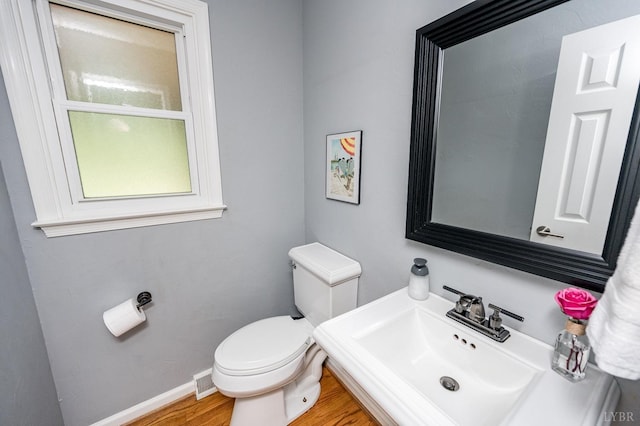 102 Stirling Ct, Forest, VA 24551 - bathroom featuring a sink and wood finished floors
