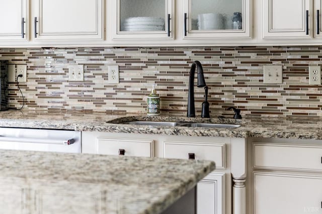 102 Stirling Ct, Forest, VA 24551 - kitchen view of dishwasher, decorative backsplash, and white cabinets