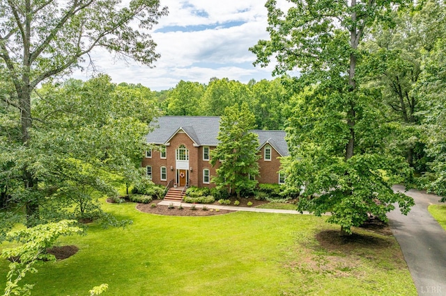102 Stirling Ct, Forest, VA 24551 - colonial-style house with a front yard and brick siding