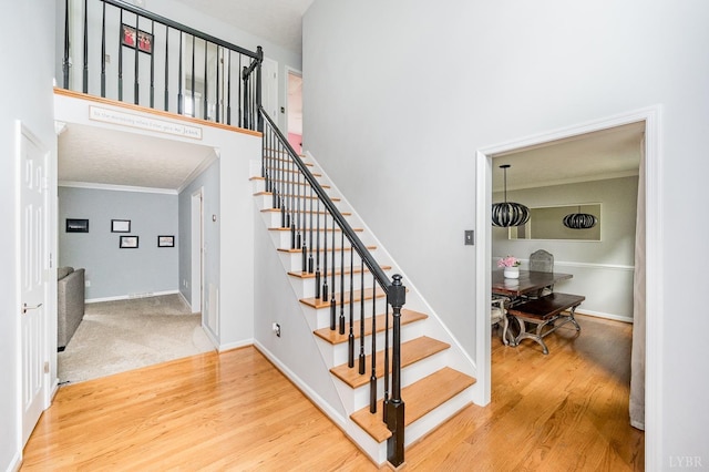 102 Stirling Ct, Forest, VA 24551 - stairway with ornamental molding and wood finished floors