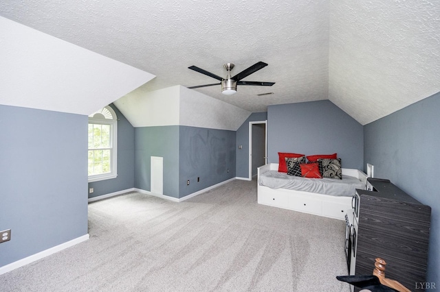 102 Stirling Ct, Forest, VA 24551 - bedroom featuring a textured ceiling, vaulted ceiling, carpet, and ceiling fan