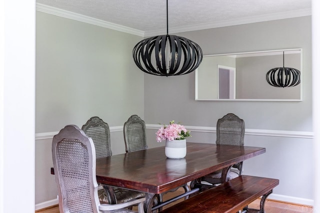 102 Stirling Ct, Forest, VA 24551 - dining space with a chandelier, ornamental molding, wood finished floors, and a textured ceiling