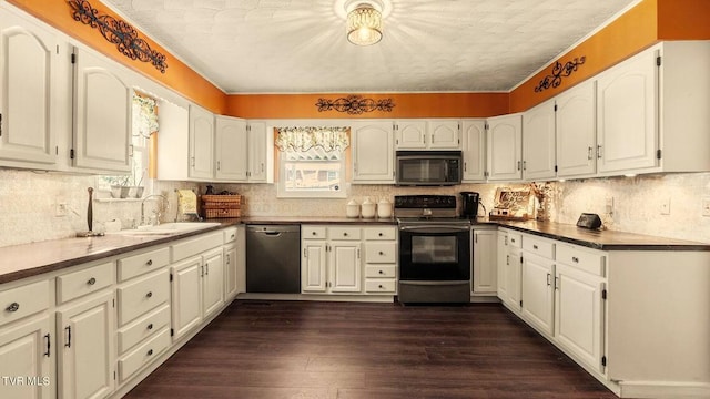 740 W 2nd N St, Morristown, TN 37814 - kitchen featuring black microwave, range with electric stovetop, a sink, white cabinetry, and stainless steel dishwasher