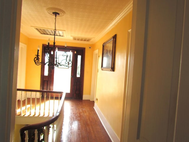 740 W 2nd N St, Morristown, TN 37814 - hall with baseboards, visible vents, crown molding, and wood finished floors