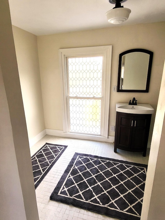 740 W 2nd N St, Morristown, TN 37814 - bathroom featuring baseboards and vanity