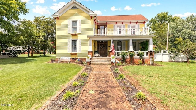 740 W 2nd N St, Morristown, TN 37814 - view of front facade with covered porch, crawl space, a front yard, and a balcony