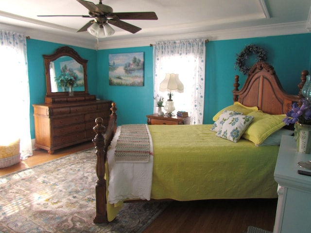 740 W 2nd N St, Morristown, TN 37814 - bedroom with a raised ceiling, ornamental molding, wood finished floors, and a ceiling fan