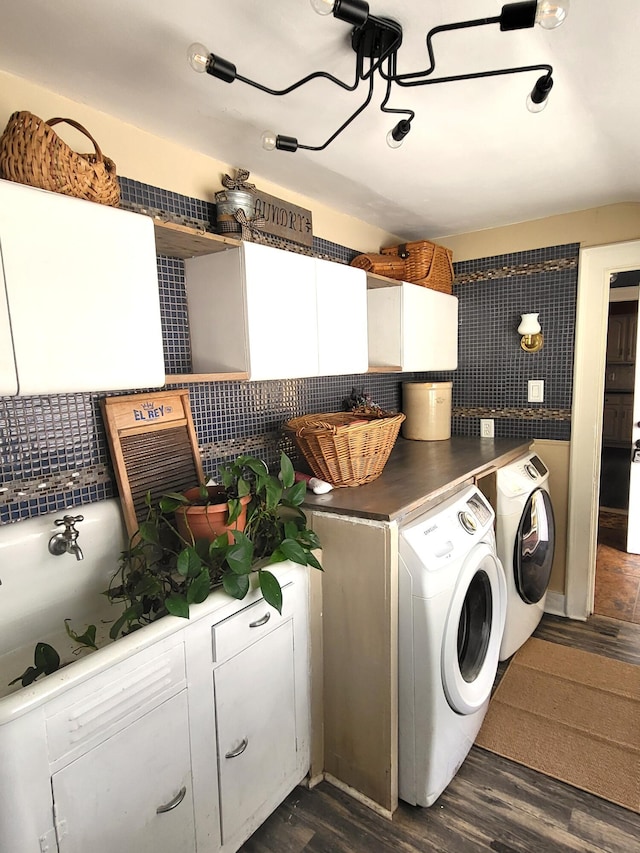 740 W 2nd N St, Morristown, TN 37814 - clothes washing area featuring dark wood-style floors, washer and clothes dryer, and cabinet space