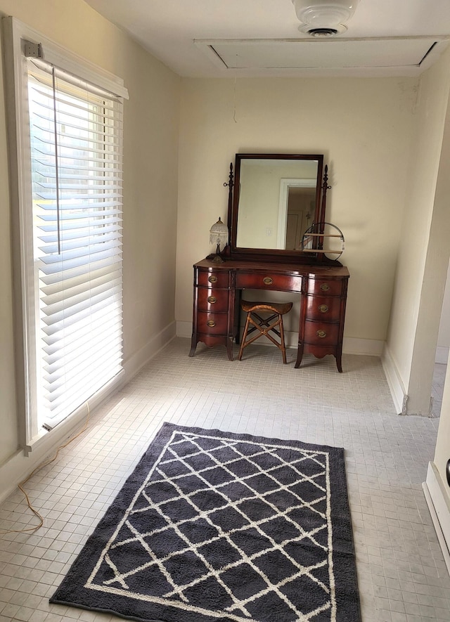 740 W 2nd N St, Morristown, TN 37814 - sitting room featuring attic access, tile patterned flooring, and baseboards
