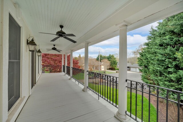 exterior space with a ceiling fan