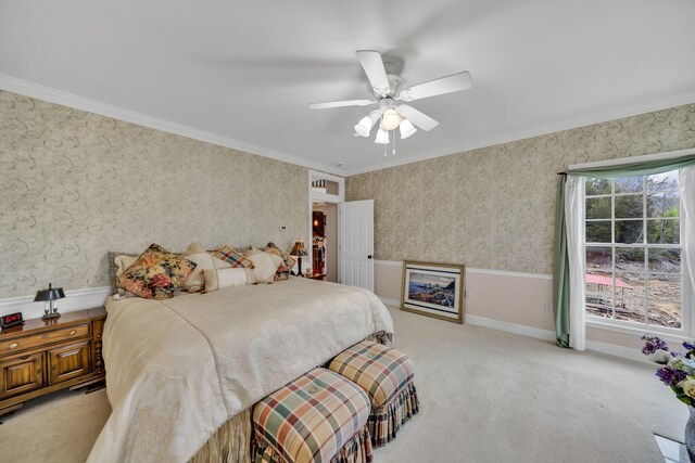 bedroom with carpet flooring, wallpapered walls, crown molding, and baseboards