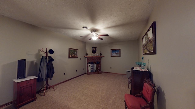 miscellaneous room with light carpet, a textured ceiling, and a brick fireplace