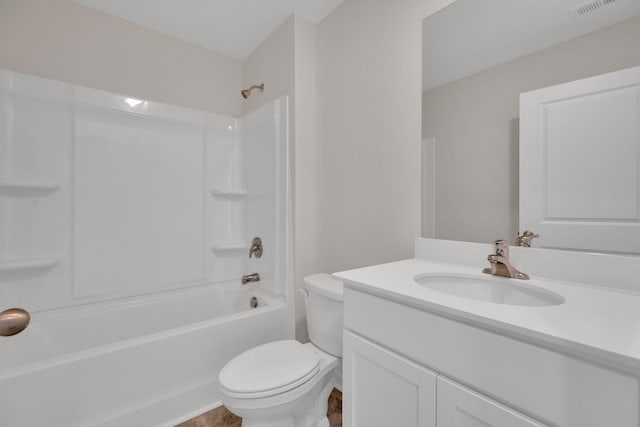 full bath featuring visible vents, shower / bathtub combination, vanity, and toilet