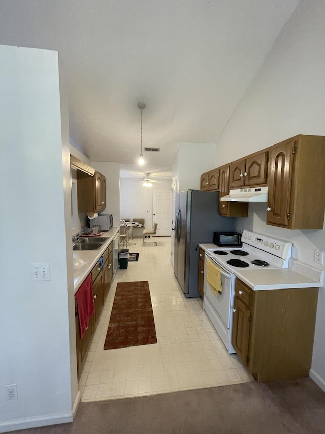 kitchen with white electric range oven, under cabinet range hood, light countertops, a ceiling fan, and a sink