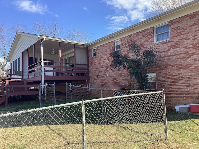 rear view of house with a lawn