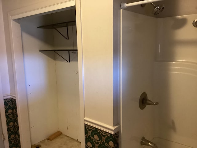 bathroom featuring bathtub / shower combination