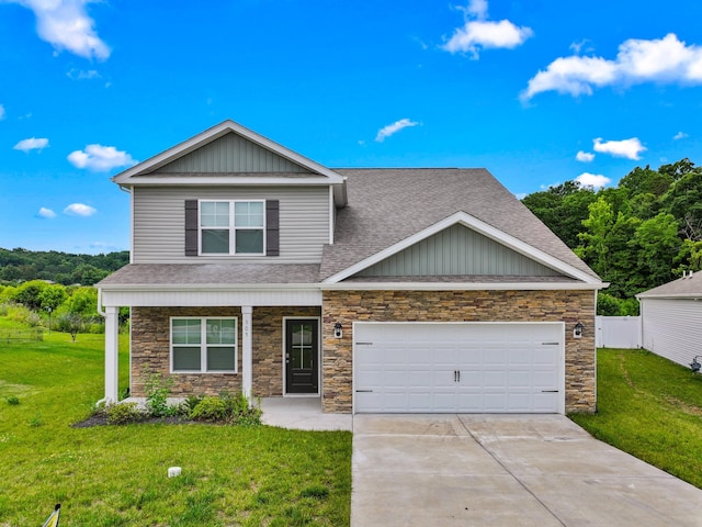 305 Eclipse Ln, Knoxville, TN 37924 - craftsman house featuring stone siding, roof with shingles, driveway, a porch, and an attached garage